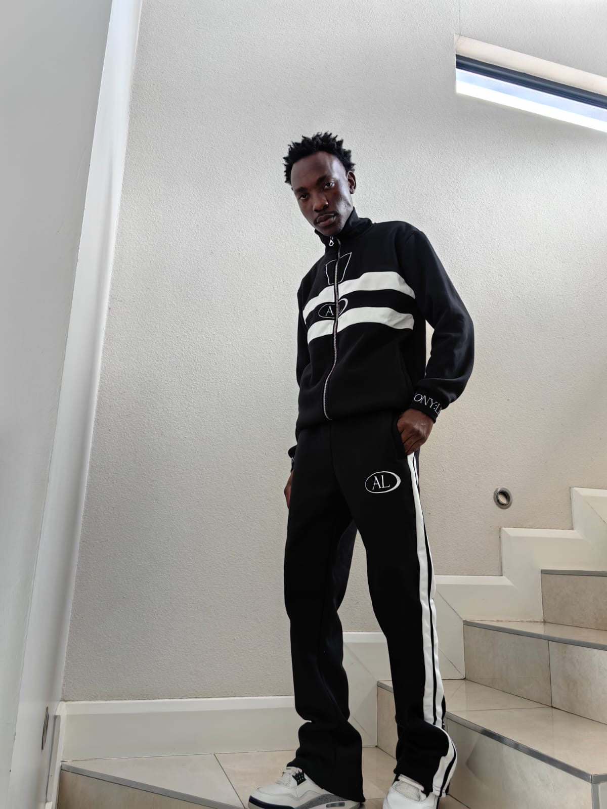 Anthony leaps track pants