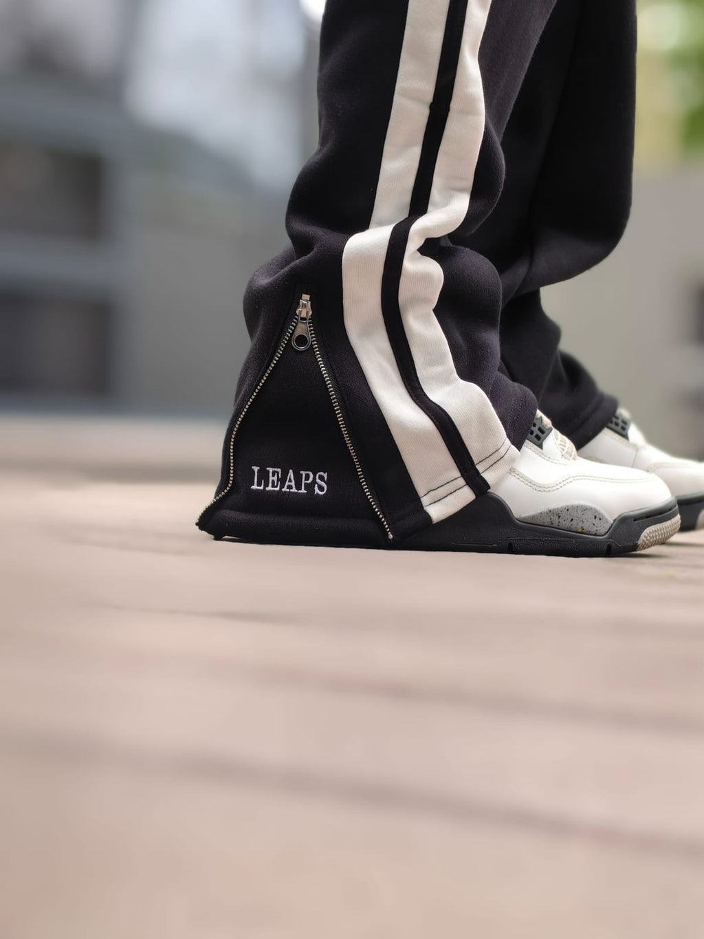 Anthony leaps track pants