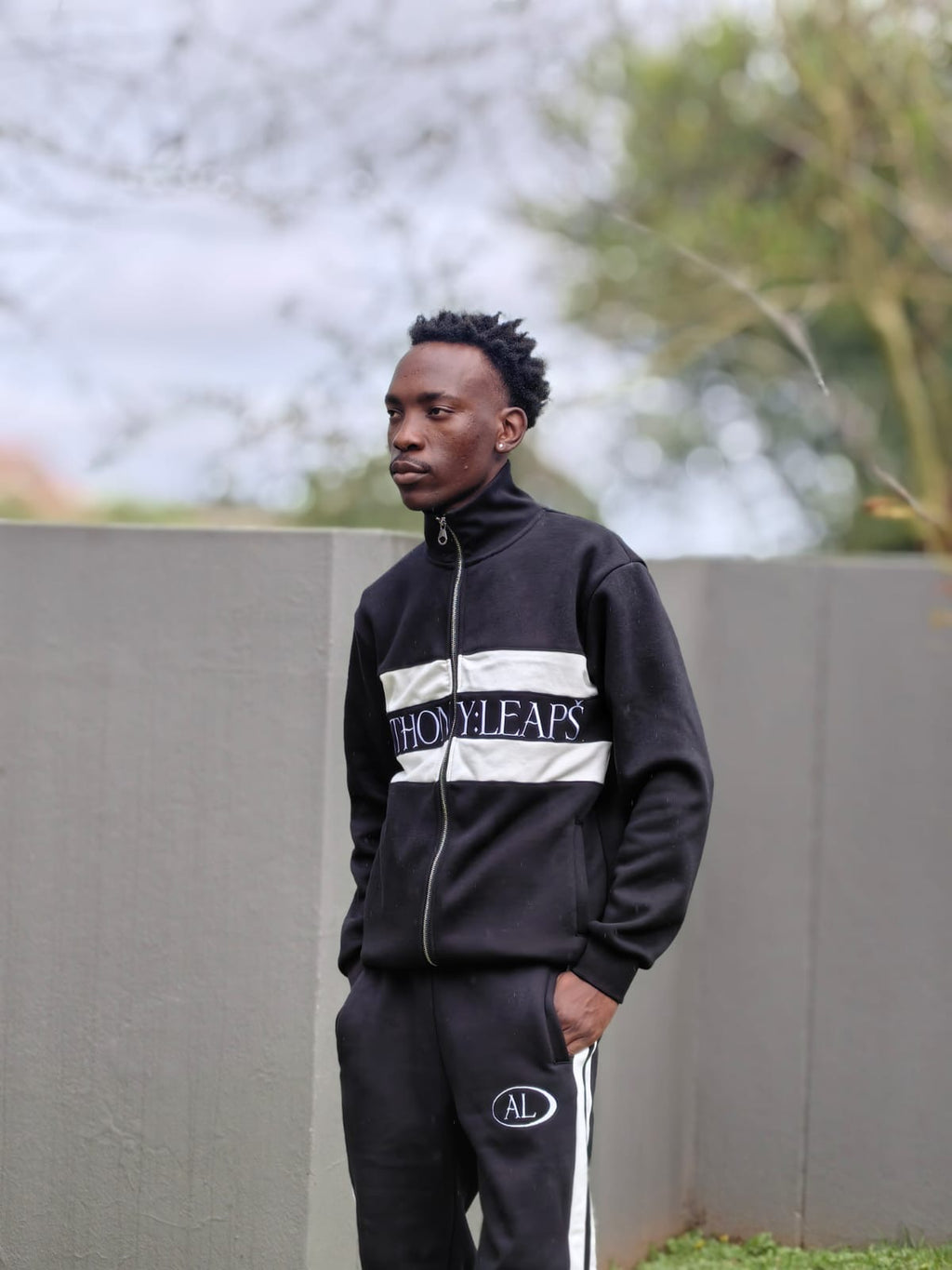 Anthony leaps track top cross branded